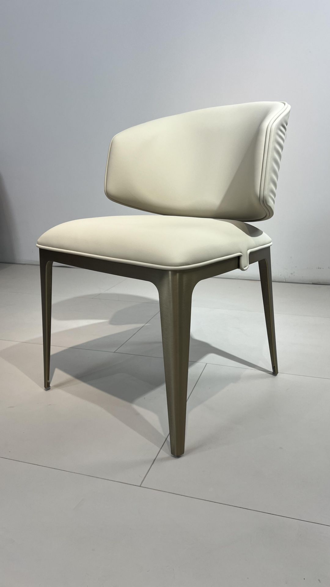 Sybilla Luxury Designer Leather Creative Stainless Steel Chair