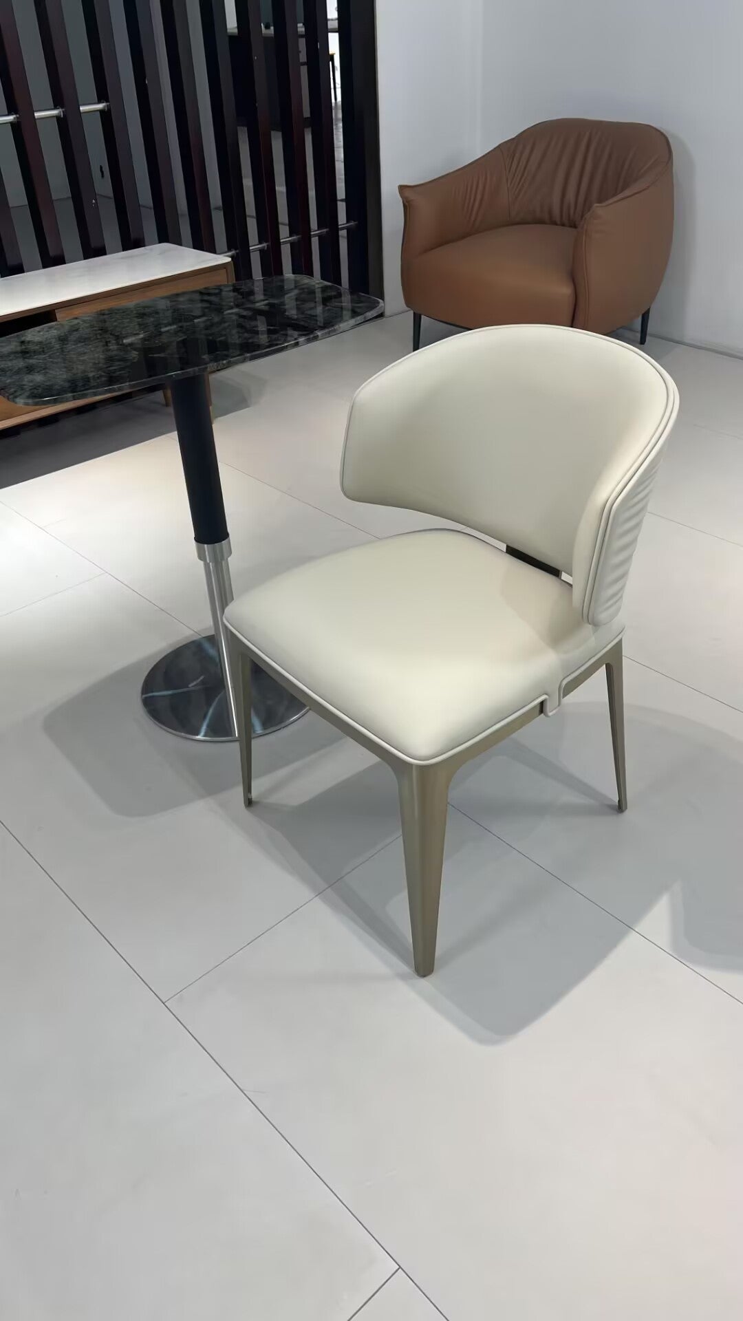 Sybilla Luxury Designer Leather Creative Stainless Steel Chair